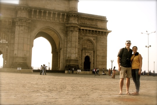 Pat and Al outside the Gateway to India. For the past two hundred years, this monument has served as the entry point and welcoming signal to countless of visitors to India.